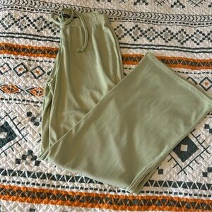 Pastel green ribbed women’s leggings. Size small super cute drawstring pants.